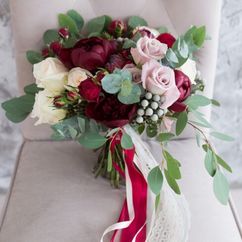 Luxury burgundy and blush rose bridal bouquet with garden roses and eucalyptus greenery, elegant hand‑tied floral bouquet, Toronto and GTA flower delivery