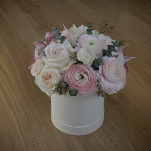 Luxury blush and ivory rose and ranunculus flower box with eucalyptus greenery in a white hat box, soft pastel floral arrangement, Toronto flower delivery