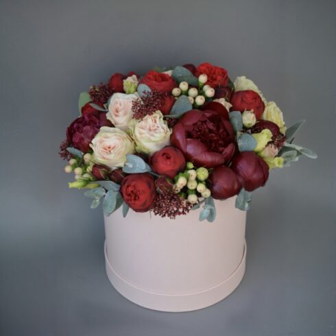 Luxury burgundy and blush flower box with peonies, roses, seasonal flowers and greenery in a blush pink hat box, Toronto and GTA flower delivery