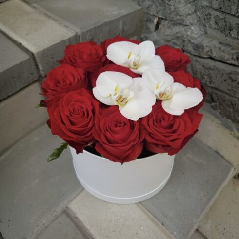 Luxury red rose and white orchid flower box in a modern white hat box, romantic floral arrangement, Toronto flower delivery