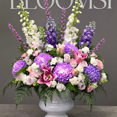 Heavenly Lavender Tribute Arrangement with lilies, chrysanthemums and premium seasonal flowers
