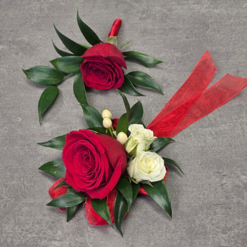 Classic Red Rose Corsage and Boutonniere Set with red roses and greenery by BLOOMSI
