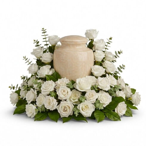 Luxury white rose urn flower arrangement with eucalyptus and greenery by Bloomsi