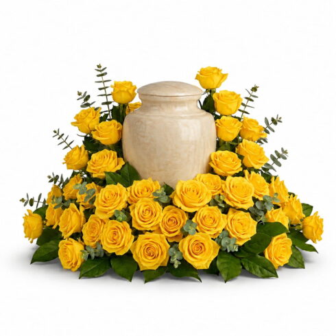 Luxury yellow rose urn flower arrangement with eucalyptus and greenery by Bloomsi